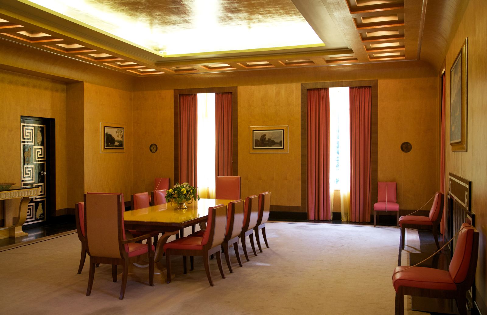 Art Deco interior with curved veneer panels and warm lighting